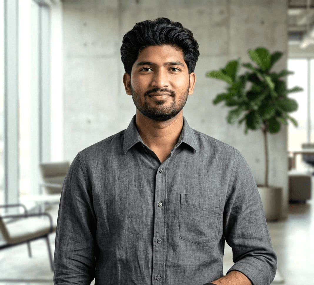 Portrait of Nabin Pariyar in a workspace